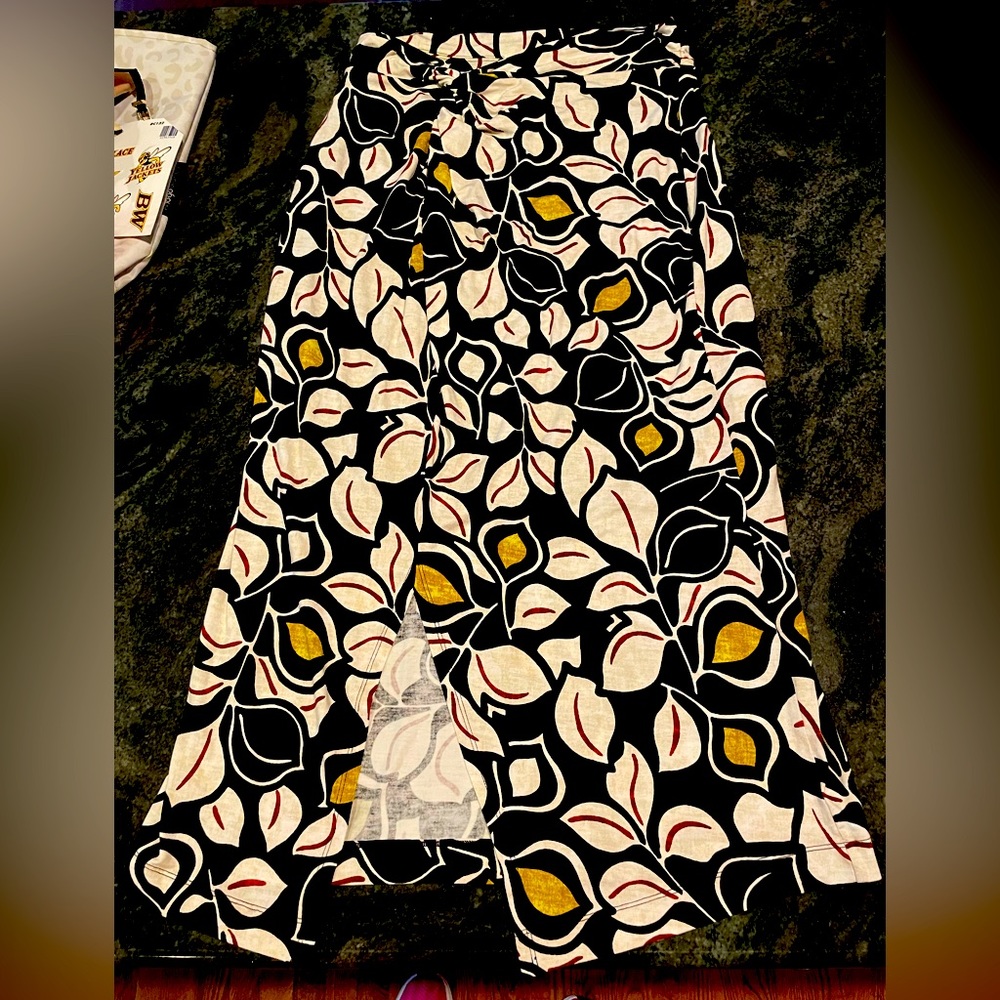 By Anthropologie Black, Yellow and~Brown Midi Skirt w\ Slit Size Medium, Lined.